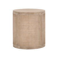 A round-shaped accent table with a cane front inlay and rounded edges, featuring a natural beige finish.