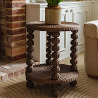 Wicker side table with decorative design in a home setting