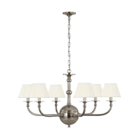 Acres Market & Interiors Embers 41" Chandelier with 5 cream pleated shades and polished nickel finish.