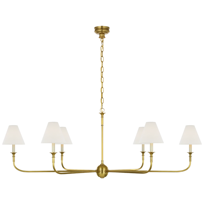 Acres Market & Interiors brass chandelier with six white linen shades and adjustable chain, classic sophistication.