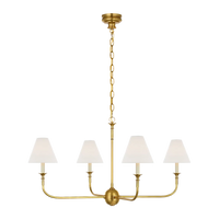 Acres Market & Interiors brass chandelier with four white linen shades and adjustable chain, classic design.