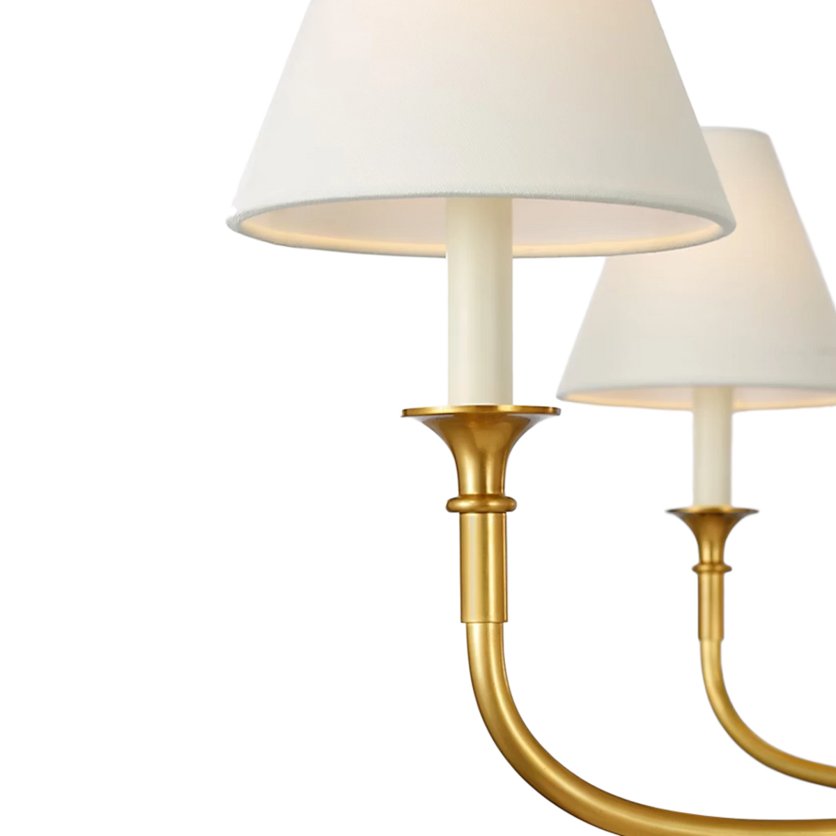 Acres Market & Interiors brass chandelier with six lights and white linen shades, classic design.